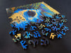 Shawn O'Keefe Jocelyn Hill wood jigsaw puzzle with colorful illustrated design and interlocking pieces on a flat surface.