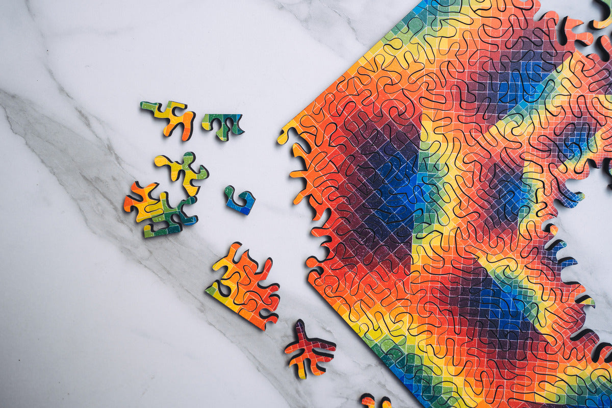 Colorful New Order jigsaw puzzle by Allyson Grey featuring intricate abstract artwork and vibrant puzzle pieces.