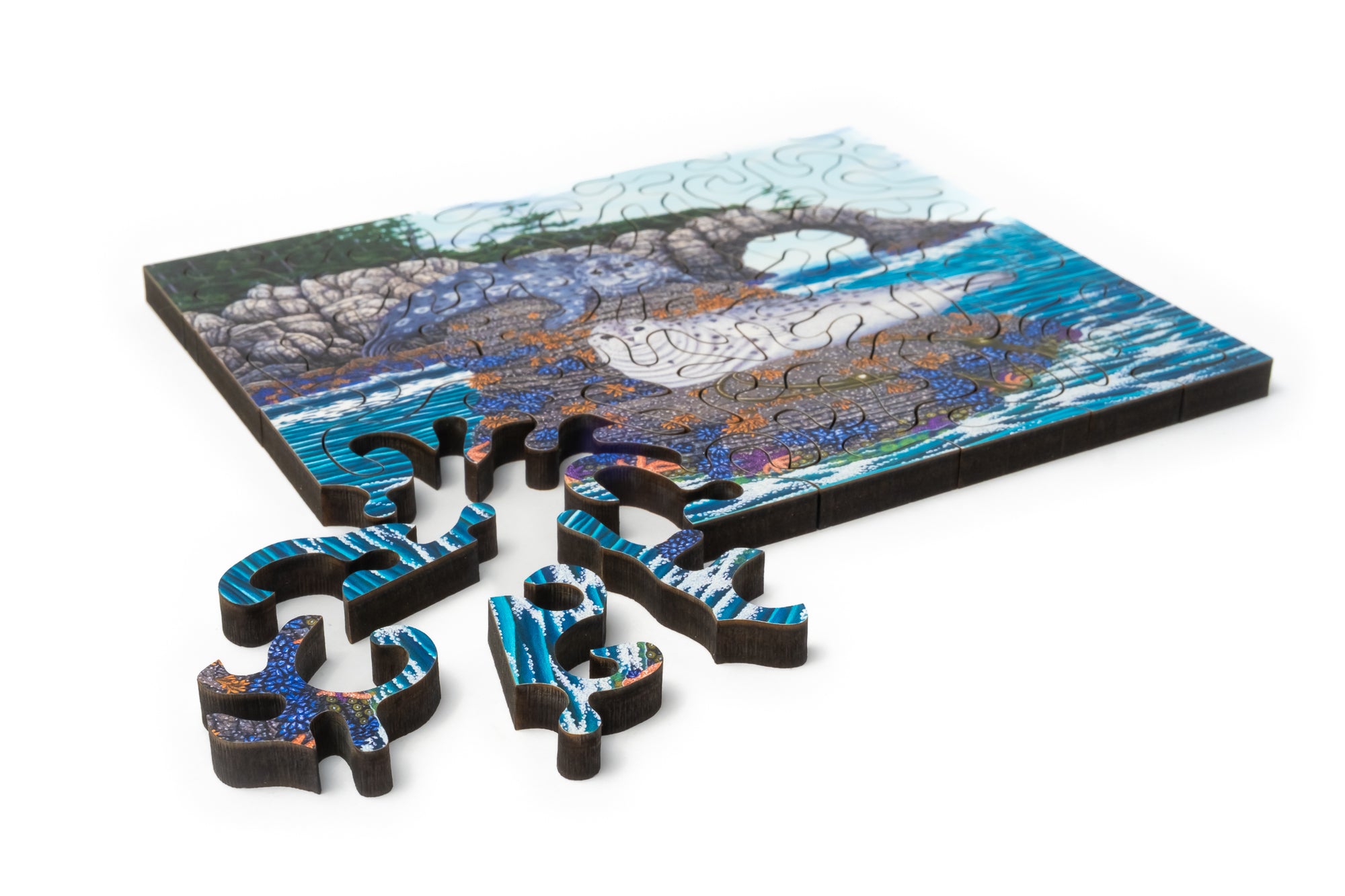 Mini wood jigsaw puzzle from Mike Semkiw's Low Tide Lounge collection featuring detailed coastal scene artwork.