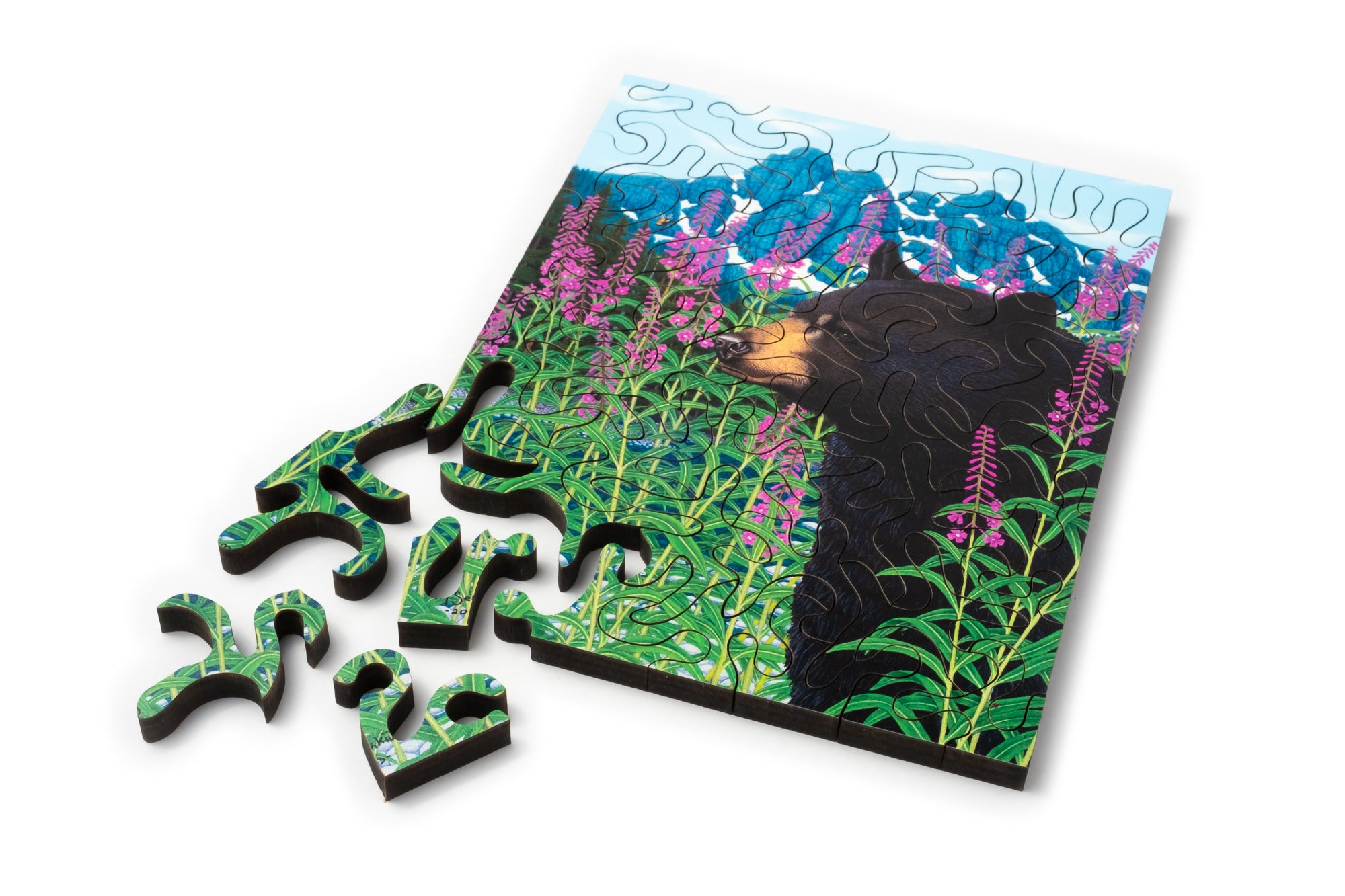 Mini wood jigsaw puzzle featuring a fireweed flower design by Mike Semkiw, perfect for puzzle enthusiasts and collectors.