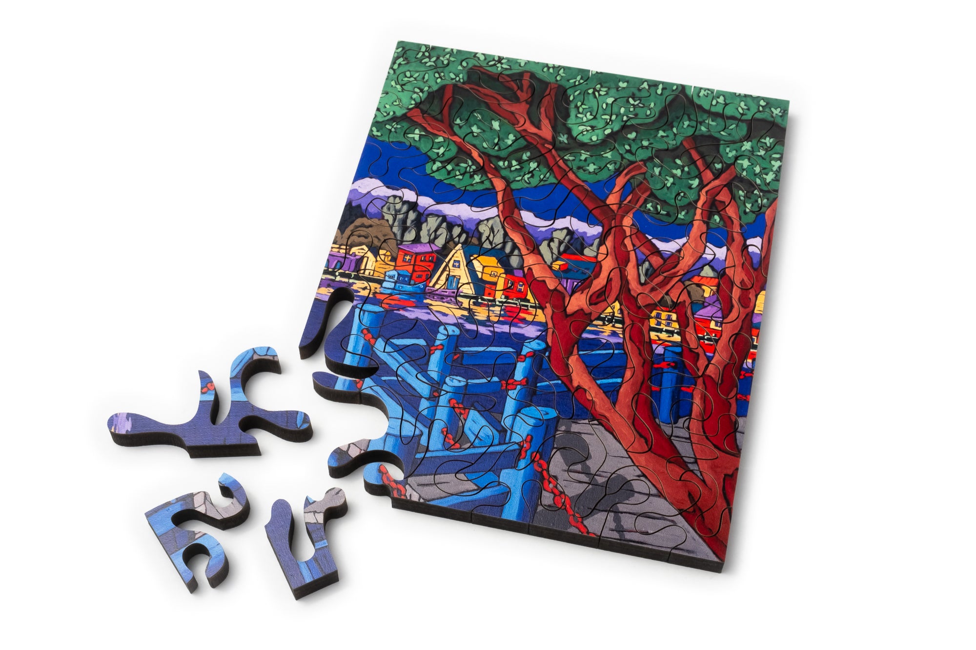 Mini wood jigsaw puzzle by Diane Adolph featuring colorful woodland scene pieces on a wooden background.