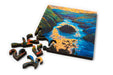 Shawn O'Keefe Jocelyn Hill mini wood jigsaw puzzle featuring colorful, detailed artwork on small wooden pieces.