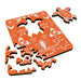Jeannie Chipps Turtle Island Mini Wood Jigsaw Puzzle showing a detailed image of a turtle and island scene on assembled puzzle pieces.